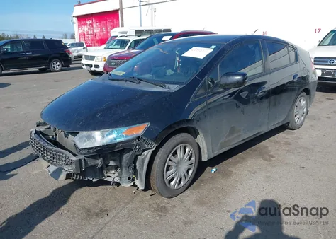 2011 Honda Insight Lx from USA, damaged, VIN JHMZE2H50BS011784